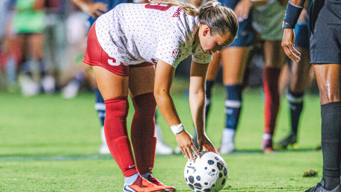 Arkansas Razorbacks forward Zoe Susi puts the ball down for a penalty kick that tied the game against the Notre Dame Fighting Irish