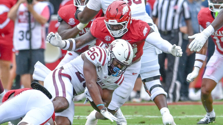 Razorbacks’ Quincy Rhodes, Mike Washington on change in coaches