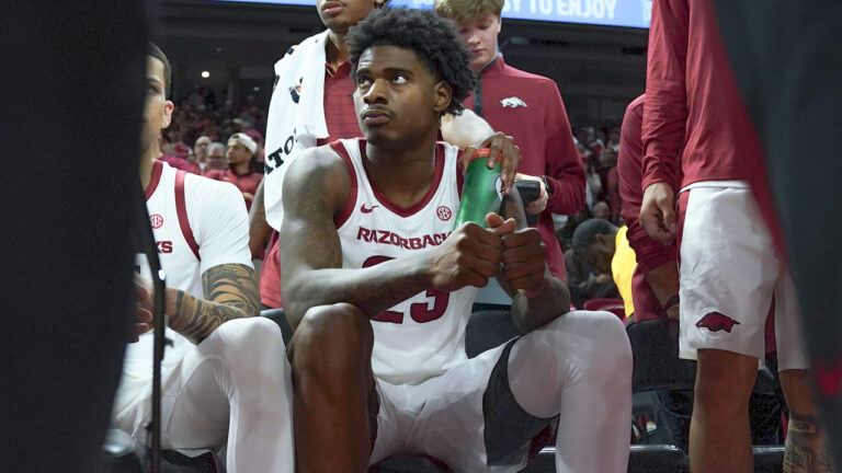 Arkansas Razorbacks forward Nick Pringle on the bench during exhibition opener against Cincinnati