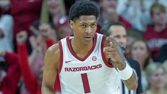 Arkansas Razorbacks guard Meleek Thomas running back upcourt against the James Madison Dukes