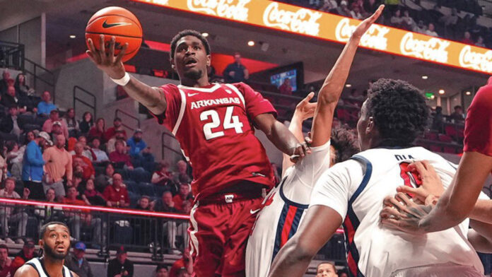Arkansas Razorbacks wing Billy Richmond drives to the basket against the Ole Miss Rebels