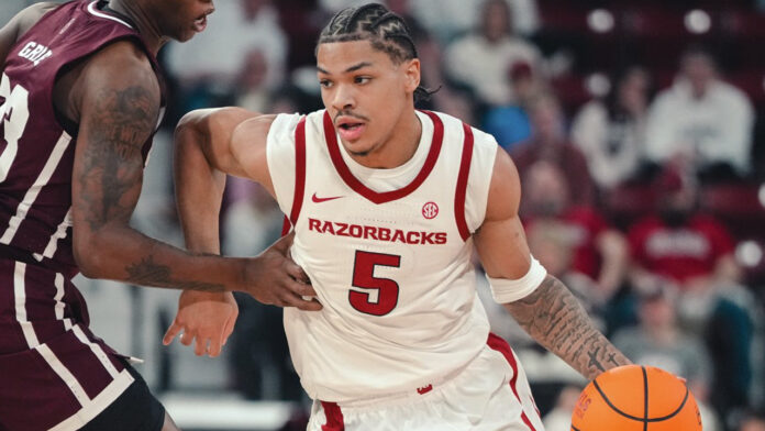 Arkansas Razorbacks guard Darius Acuff drives during game against the Mississippi State Bulldogs