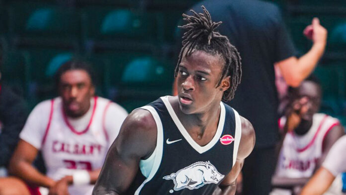 Arkansas Razorbacks Abdou Thiero after a dunk in game against Calgary