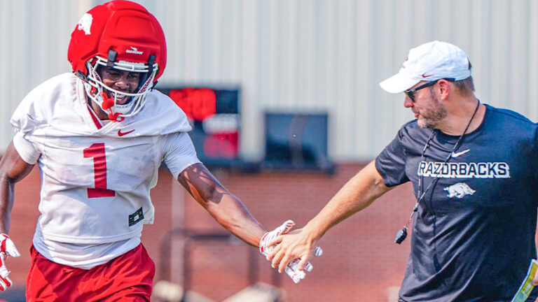 Arkansas Razorbacks' wide receiver and coach Ryan Silverfield at fall camp practice