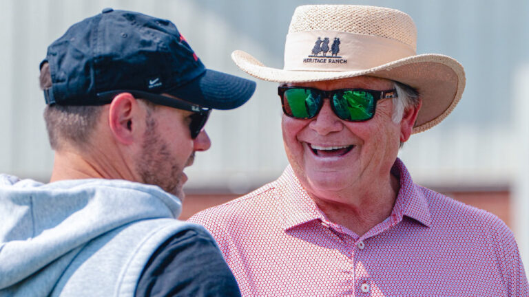 Former Razorback coach Houston Nutt with current Hogs' coach Ryan Silverfield at a fall camp practice.