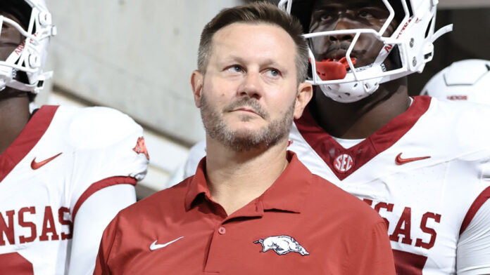 Arkansas Razorback football coach Ryan Silverfield before team comes out against the Utah Utes