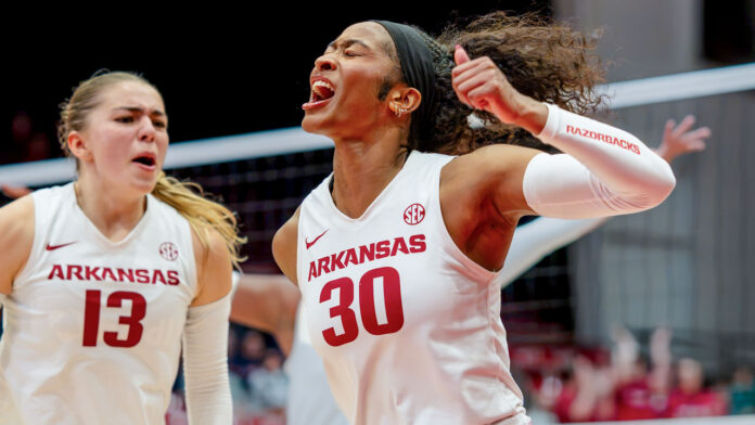Arkansas Razorbacks Romani Thurman and Kiki Remensperger react after a point in a game against the Auburn Tigers at Barnhill Arena