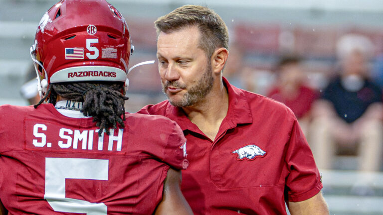 Arkansas Razorbacks coach Ryan Silverfield with running back Sutton Smith during game against the Tulsa Golden Hurricane at Razorback Stadium
