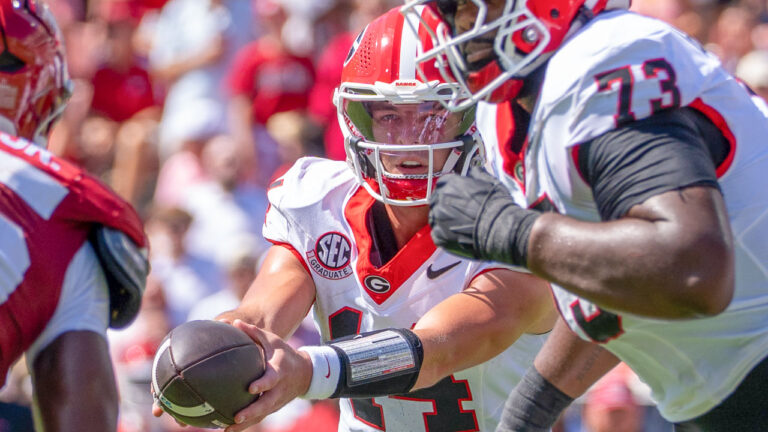 Georgia Bulldogs quarterback Gunner Stockton in game against the Arkansas Razorbacks at Razorback Stadium