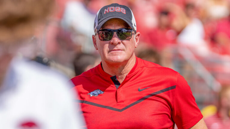 Arkansas Razorbacks athletic director Hunter Yurachek on the field in warmups before game against the Georgia Bulldogs at Razorback Stadium