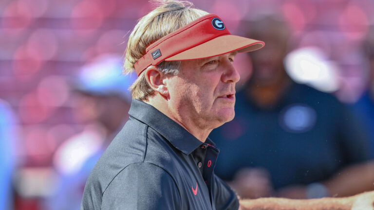 Georgia Bulldogs coach Kirby Smart in pregame warmups before game against the Arkansas Razorbacks at Razorback Stadium