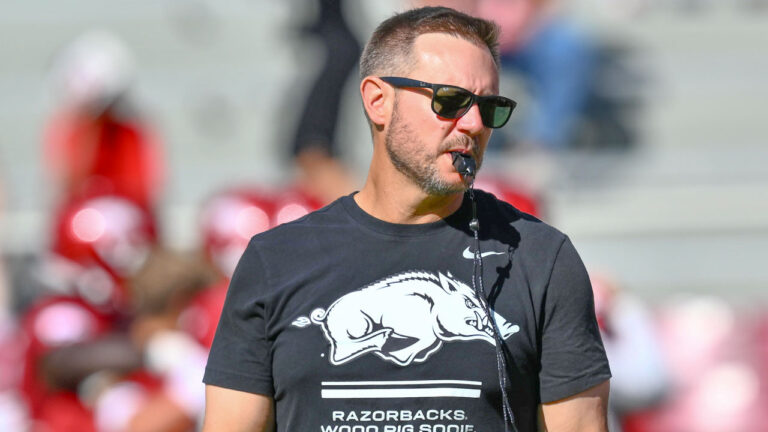 Arkansas Razorbacks coach Ryan Silverfield on the field in warmups before game against the Georgia Bulldogs at Razorback Stadium