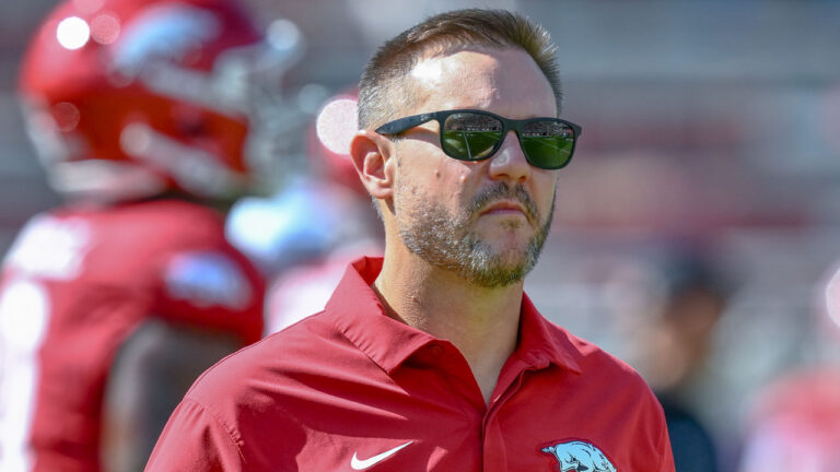 Arkansas Razorbacks coach Ryan Silverfield in pregame warmumps before game with the Tennessee Volunteers at Razorback Stadium
