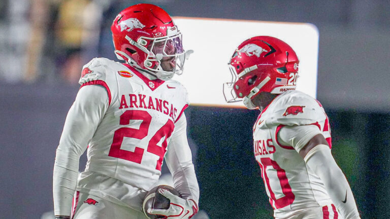 Arkansas Razorbacks defensive backs Miguel Mitchell and Joker Johnson in a game against the Vanderbilt Commodores
