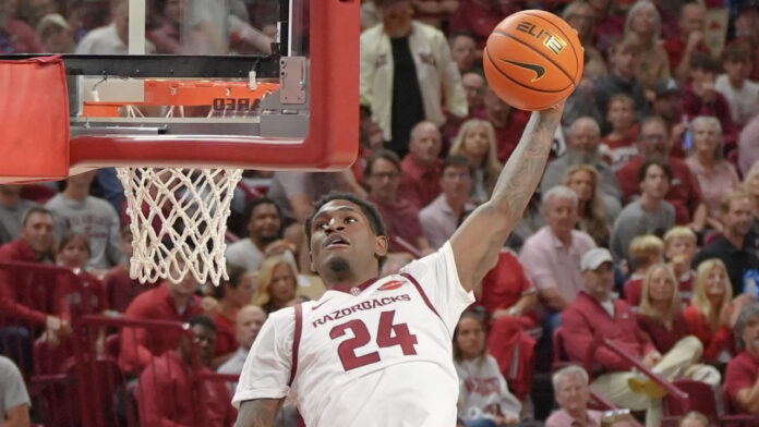 Arkansas Razorbacks Billy Richmond III going up for another dunk against the Memphis Tigers at Bud Walton Arena