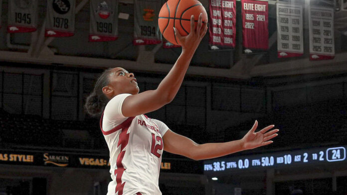 Arkansas Razorbacks Grace McCallop drive in for a layup in a game against Cameron at Bud Walton Arena